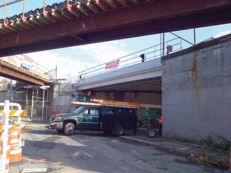 Clayton St. bridge: After months of preparation, workers swung a new bridge into place above Clayton Street over the Veterans Day weekend. The new span, pictured above, carries Red Line trains above the street en route to and from Fields Corner station. 	Photo courtesy MBTA